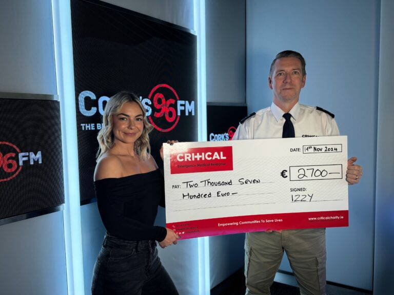 CRITICAL CEO David Tighe accepts a cheque for €2,700 from Isabel Bartak-Healy, Izzy Showbizzy of Cork’s 96FM, who participated in a challenging Camino trek to raise money for the charity.